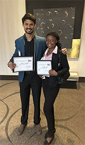 Janet and Tahmid photo with awards